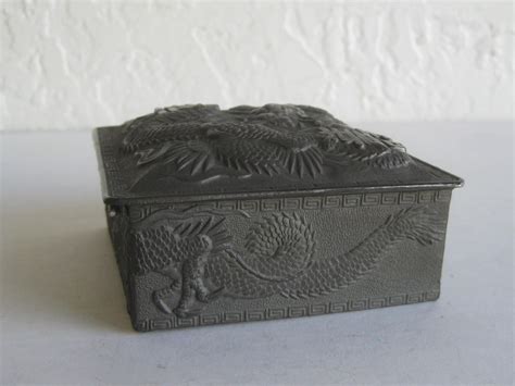 metal japanese box with dragons and honeycomb bottom worth|Antique Japanese Metal Relief Dragon Design Lidded Stash.